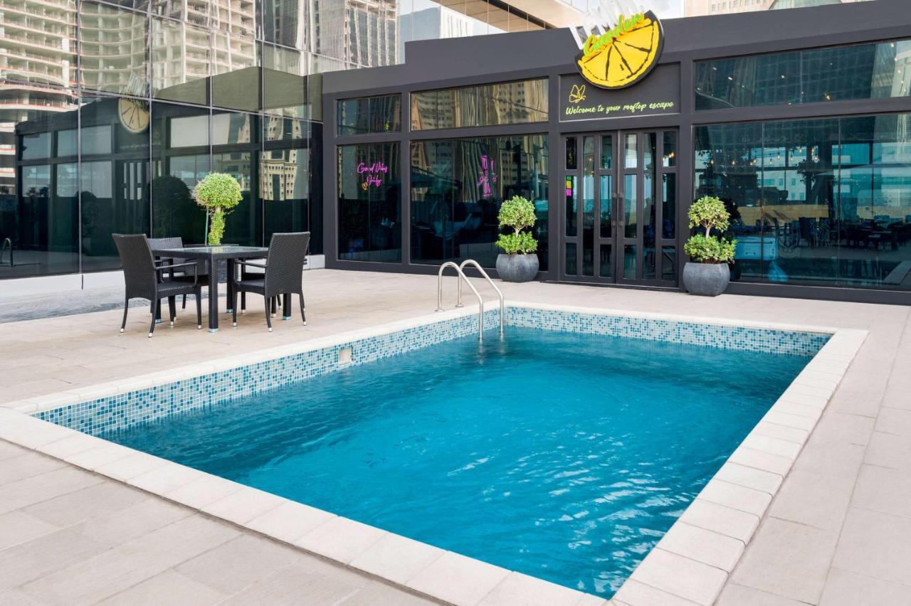 מלון Wyndham Doha West Bay מראה חיצוני תמונה The Lemon Pool