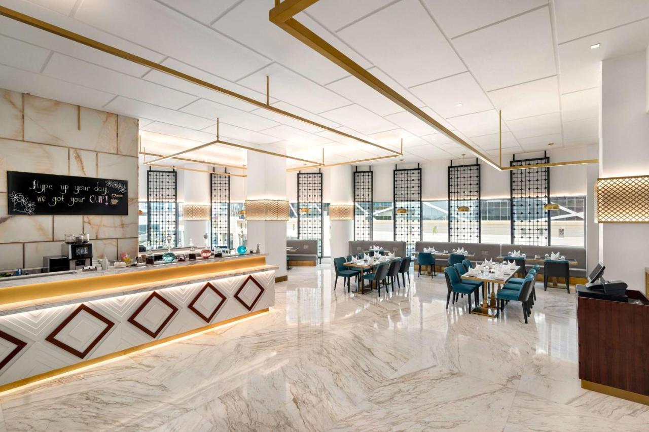 מלון Wyndham Doha West Bay מראה חיצוני תמונה 3D rendering of a restaurant